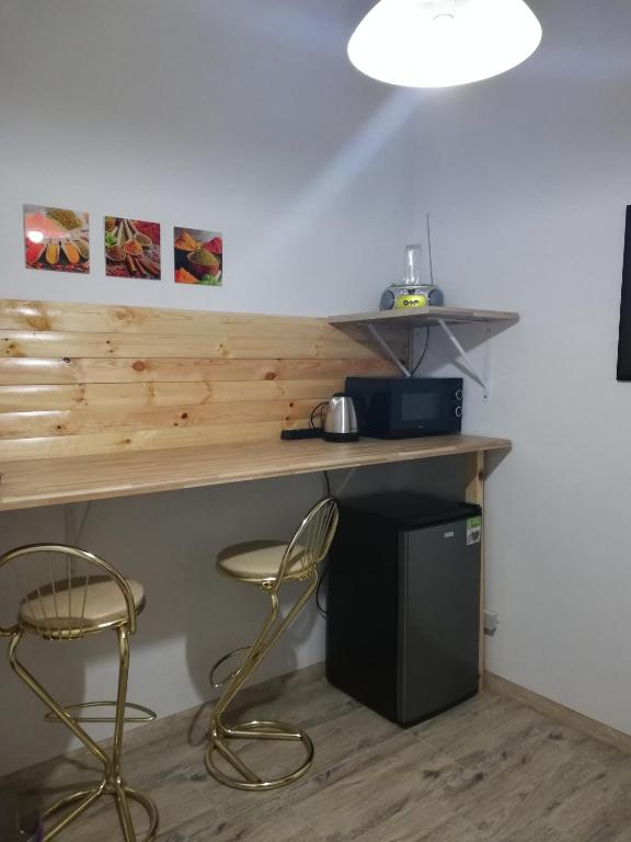 Kuchyňa alebo kuchynka v ubytovaní Apartament wSPAniały.