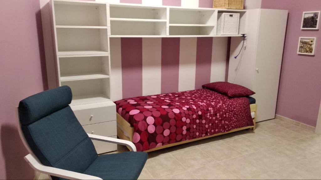 Posteľ alebo postele v izbe v ubytovaní B&B Rossini