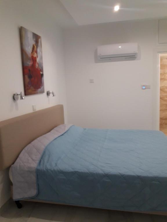 Postel nebo postele na pokoji v ubytování P L Sunorama Beach Garden 302
