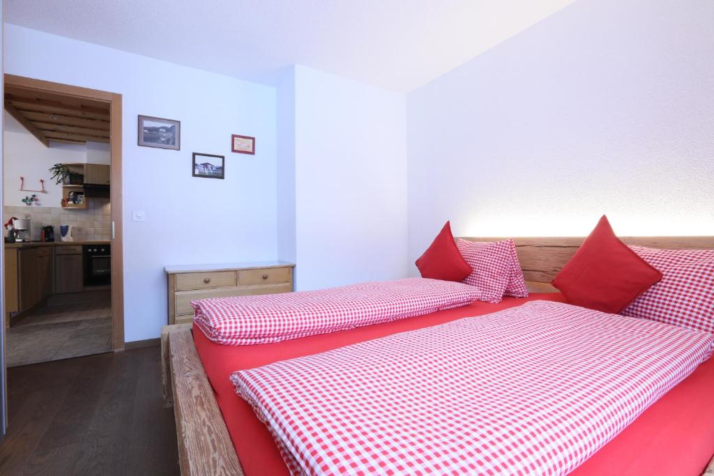 Postel nebo postele na pokoji v ubytování B&B Stiffler-Huus