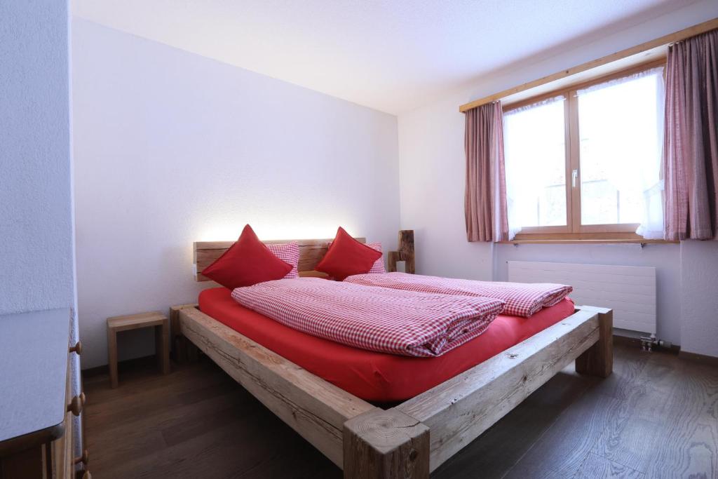 Postel nebo postele na pokoji v ubytování B&B Stiffler-Huus