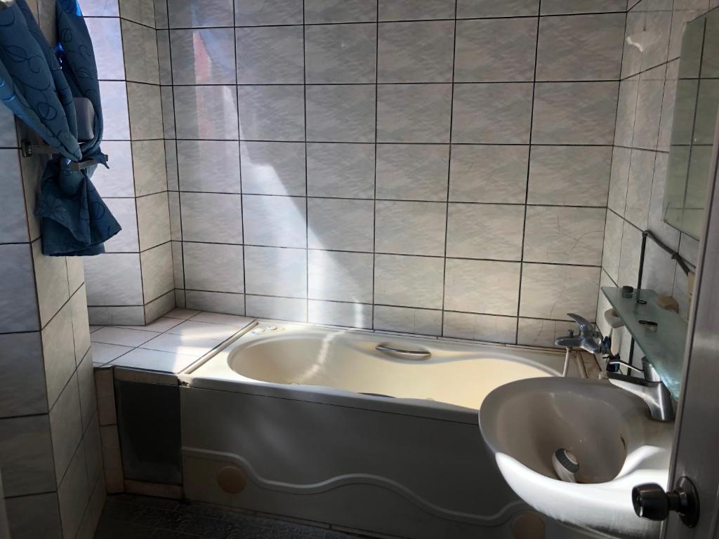Koupelna v ubytování Kai Cheng Inn 旅館134