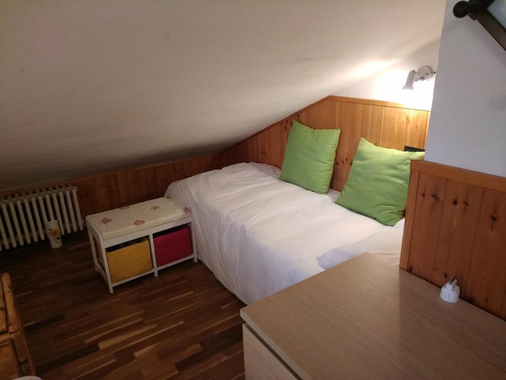 Łóżko lub łóżka w pokoju w obiekcie Condominio Esagono