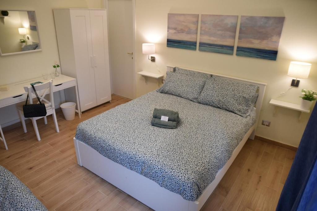Postel nebo postele na pokoji v ubytování Villa Le Garden