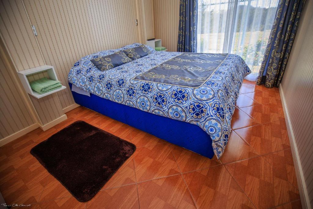 Postel nebo postele na pokoji v ubytování Marina Pichilemu