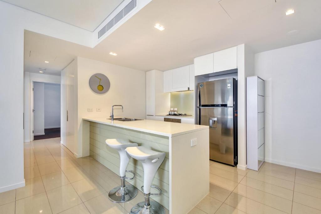 Kuchyň nebo kuchyňský kout v ubytování Darwin Waterfront Short Stay Apartments