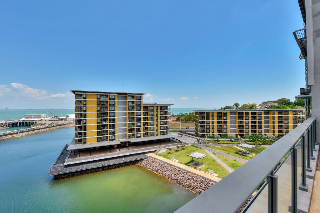 a large body of water with a bridge over it at Darwin Waterfront Short Stay Apartments in Darwin