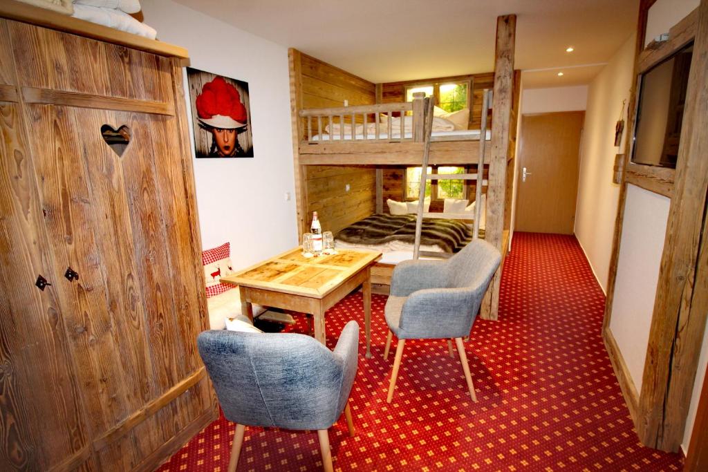 Kuchyň nebo kuchyňský kout v ubytování Hotel & Restaurant Grüner Baum - Die Grüne Oase Am Feldberg