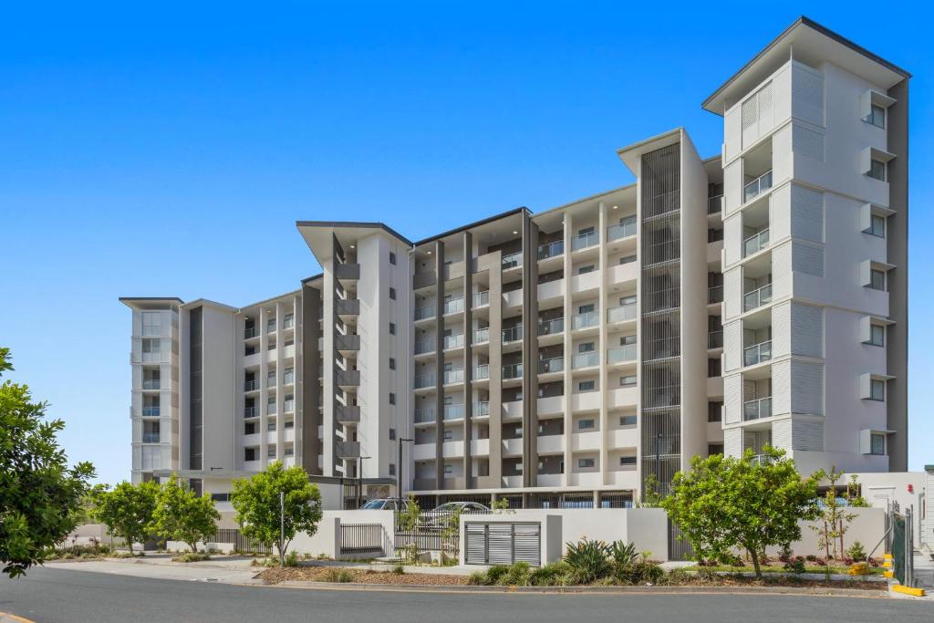 an image of an apartment building at North Shore Oceanside Kawana in Kawana Waters