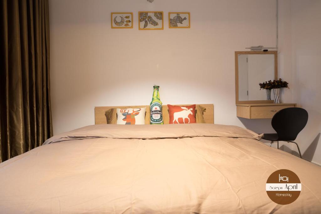 Postel nebo postele na pokoji v ubytování Saigon April Homestay