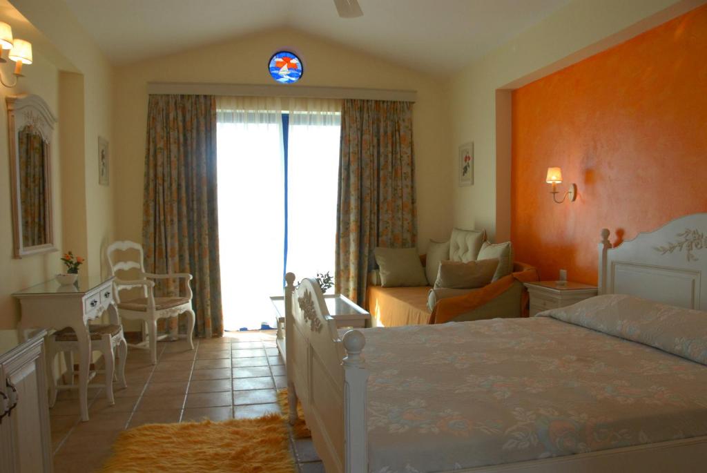Postel nebo postele na pokoji v ubytování Agnadi Hotel