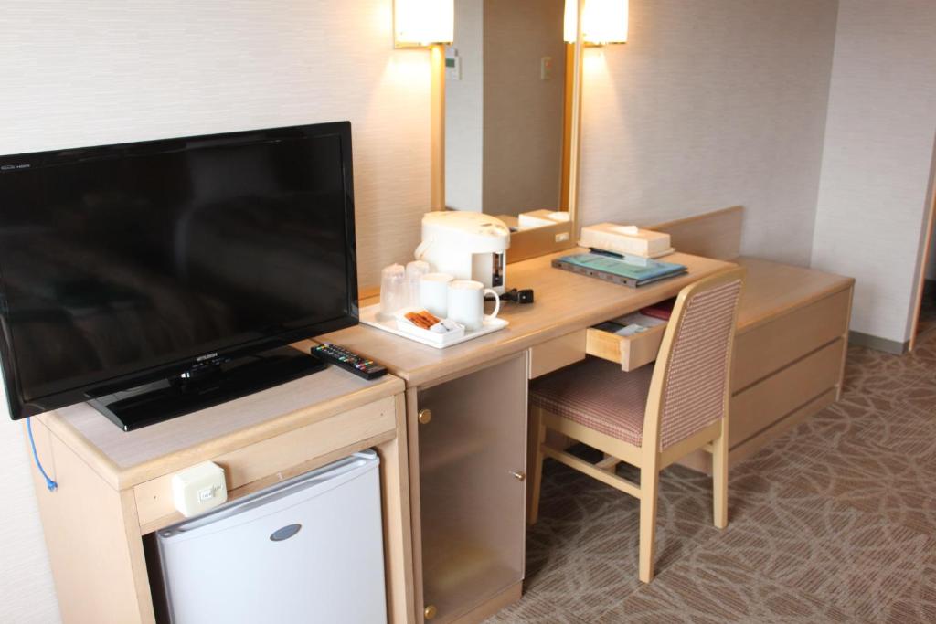 TV a/nebo společenská místnost v ubytování Rako Hananoi Hotel