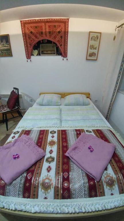 Postel nebo postele na pokoji v ubytování Apartments Vratnik
