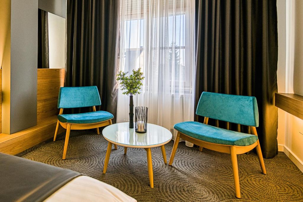 Uma área de estar em Hotel Silva