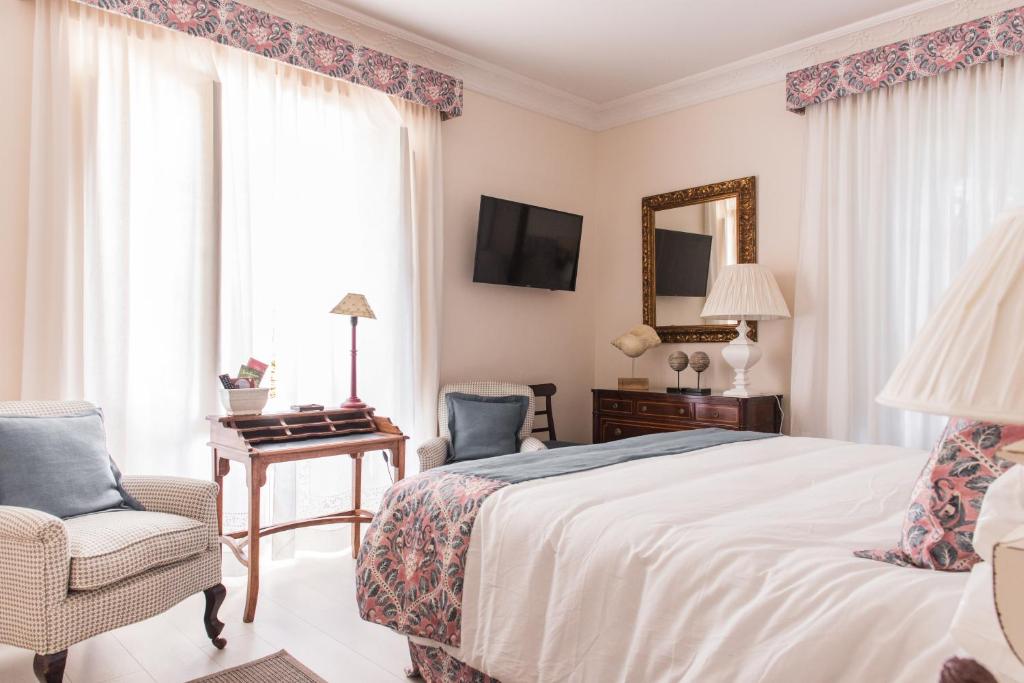 Postel nebo postele na pokoji v ubytování Suites de Franchy