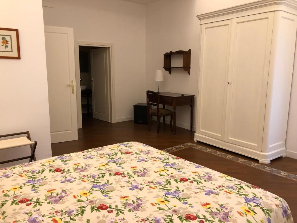 Postel nebo postele na pokoji v ubytování All'Angolo B&B