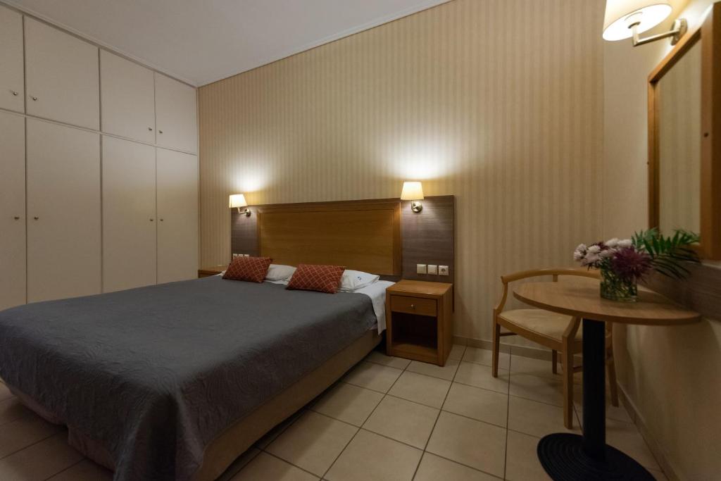 Postel nebo postele na pokoji v ubytování Hotel Ostria