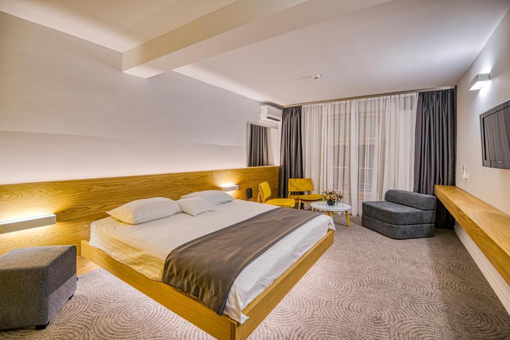 Uma cama ou camas num quarto em Hotel Silva