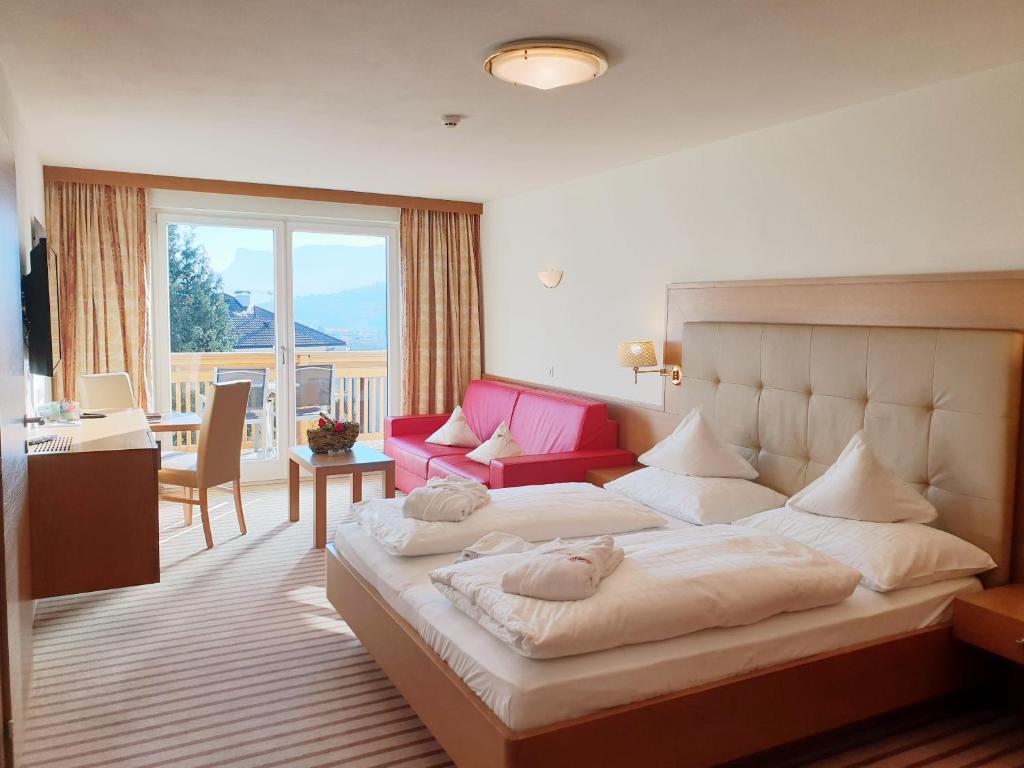 Postel nebo postele na pokoji v ubytování Ruster Resort