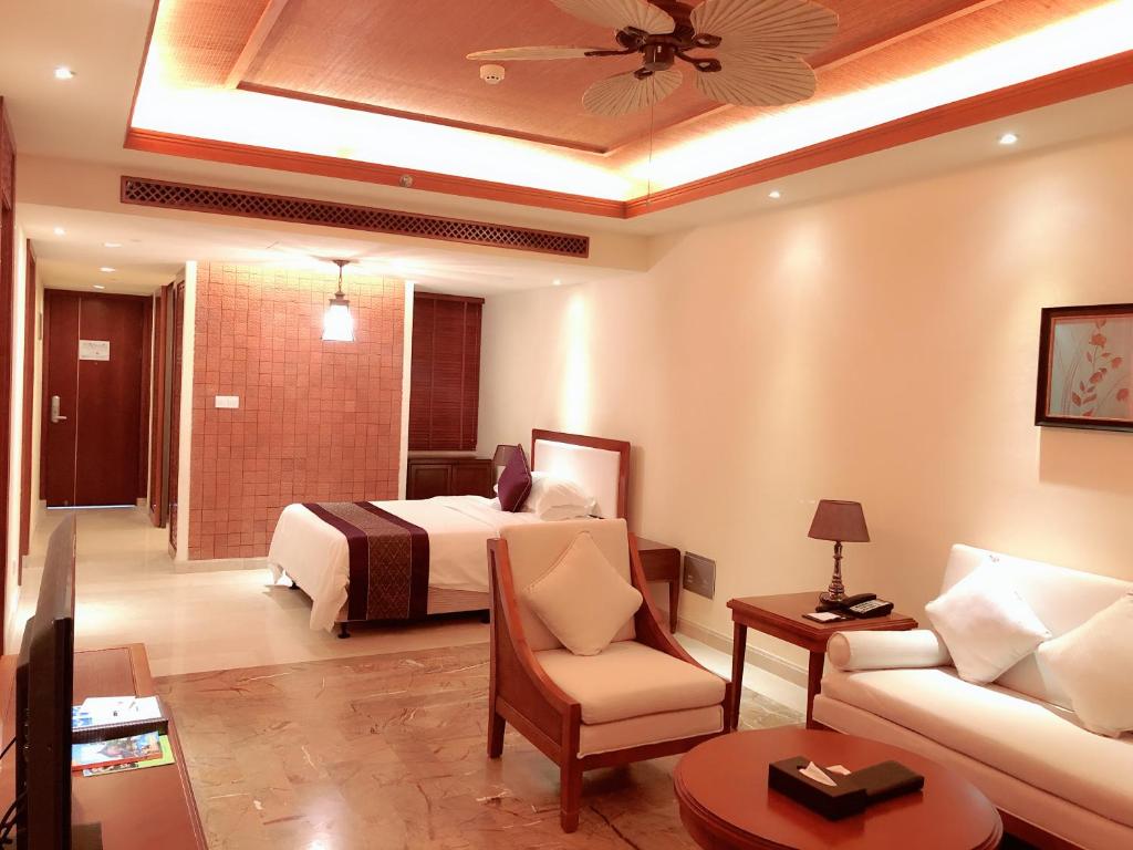 Stony Brook Villa Jianguo Resort Sanya客房内的一张或多张床位