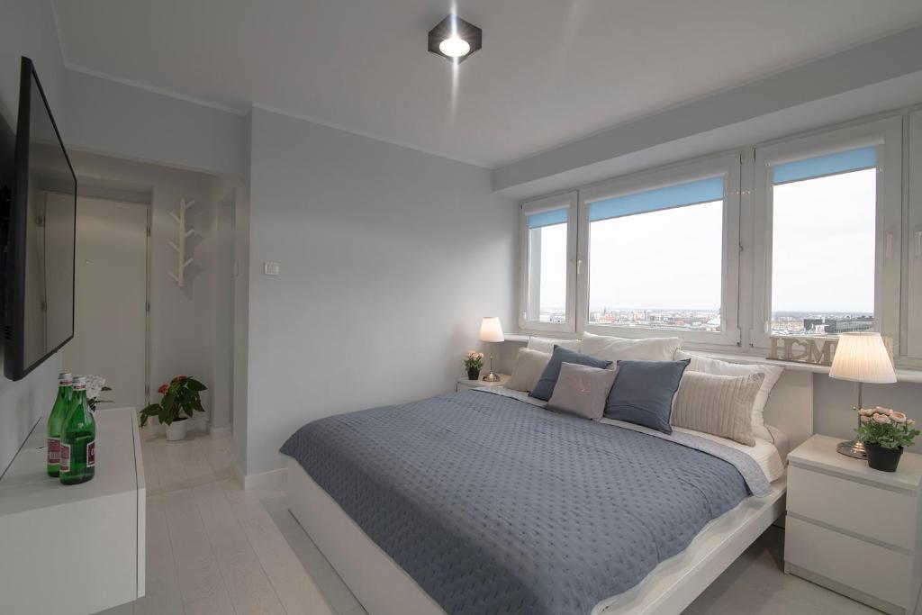 Posteľ alebo postele v izbe v ubytovaní WLR Apartments - Świętokrzyska I