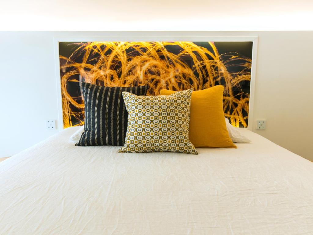 Postel nebo postele na pokoji v ubytování MiHotel Comte