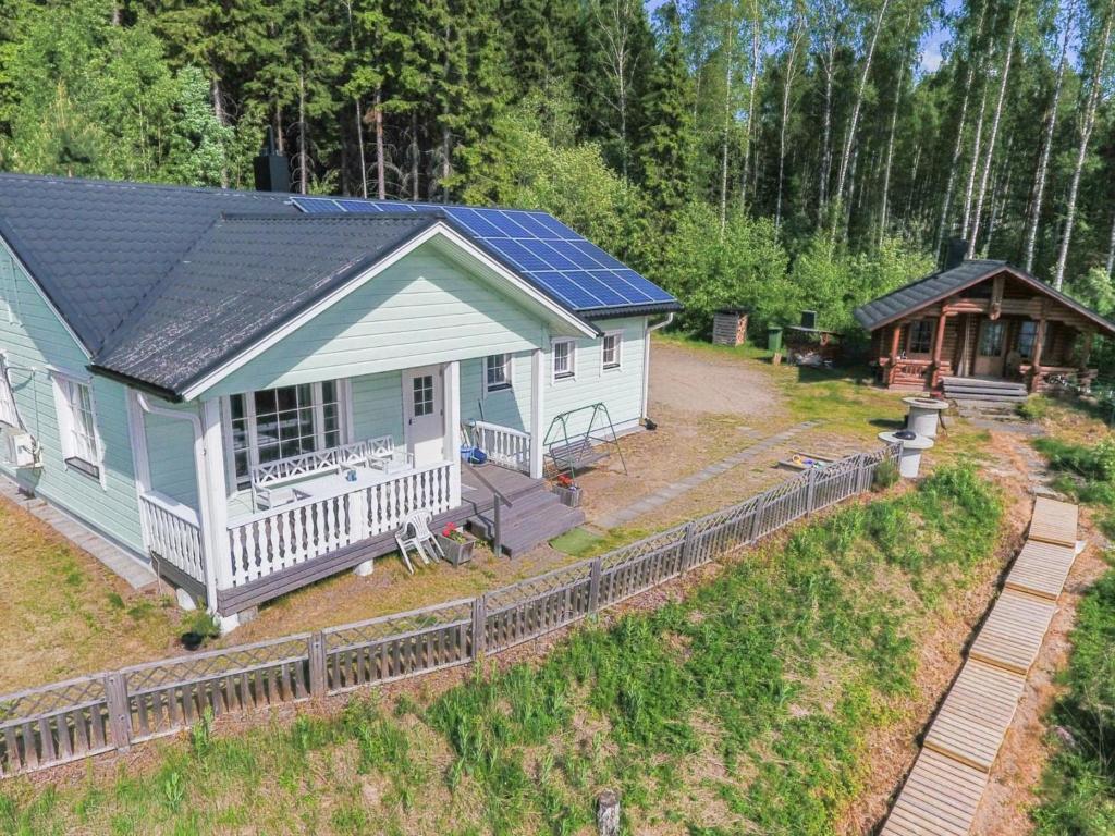 an aerial view of a house with solar panels on it at Holiday Home Koivurinne by Interhome in Vuoriniemi