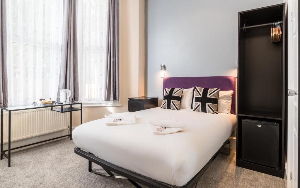 Postel nebo postele na pokoji v ubytování Royal London Hotel By Saba