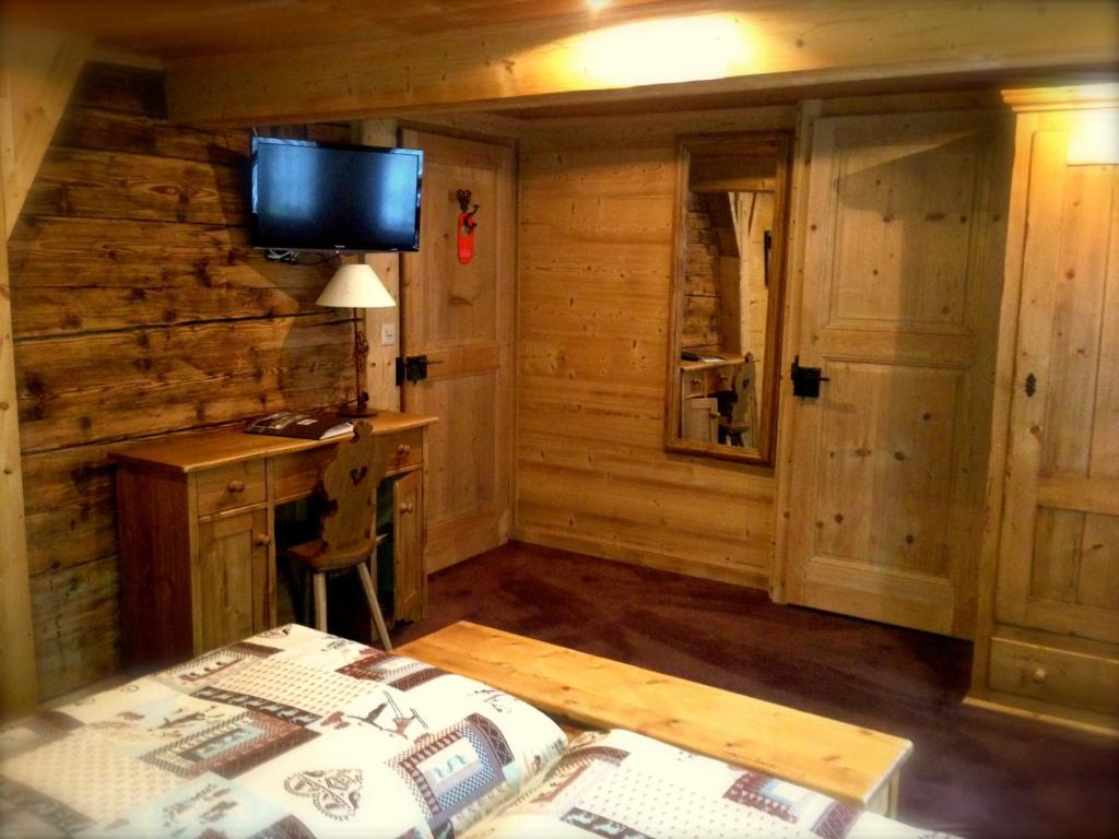 Letto o letti in una camera di Auberge de la poste