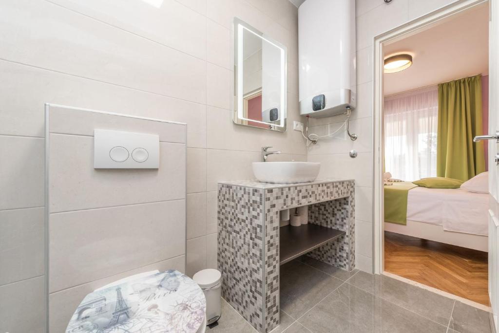 Postel nebo postele na pokoji v ubytování Villa Zdenka