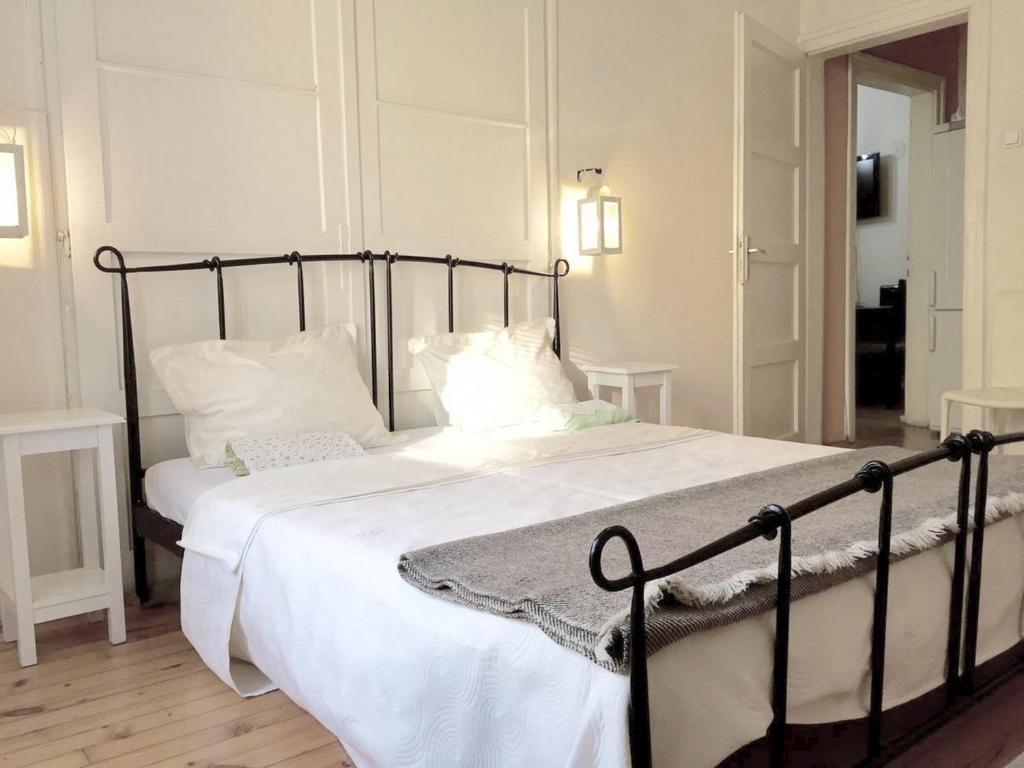 En eller flere senger på et rom på Interhost Guest rooms and apartments