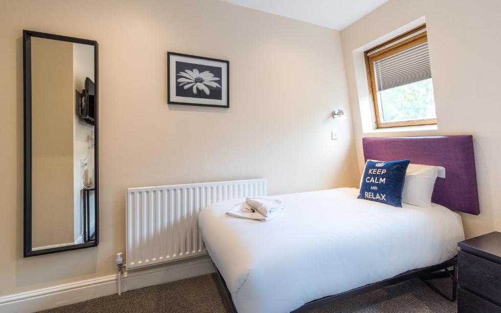 Postel nebo postele na pokoji v ubytování Royal London Hotel By Saba