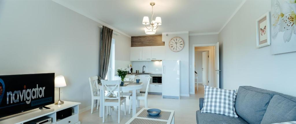 Kuchyňa alebo kuchynka v ubytovaní Apartamenty NAVIGATOR-PORT VIEW