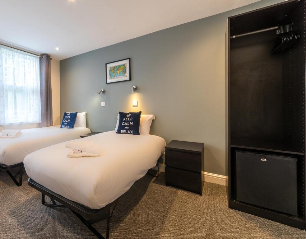 Postel nebo postele na pokoji v ubytování Royal London Hotel By Saba