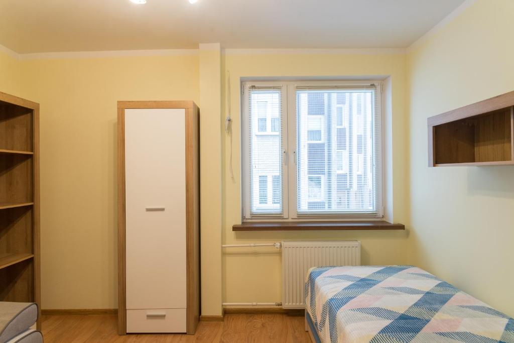 Postel nebo postele na pokoji v ubytování Apartament Na Urlop - Centrum - Przy Amfiteatrze - 500m do Basenów Wisła