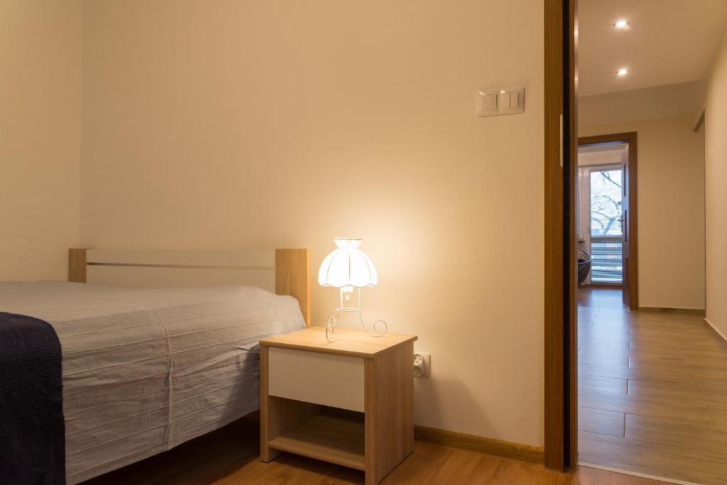 Postel nebo postele na pokoji v ubytování Apartament Na Urlop - Centrum - Przy Amfiteatrze - 500m do Basenów Wisła