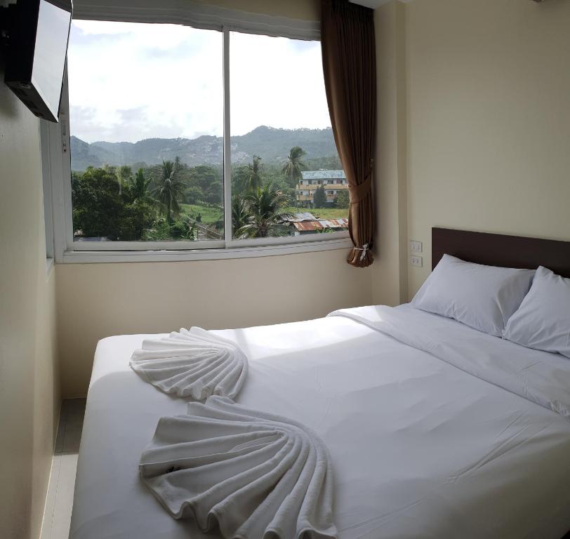 Postel nebo postele na pokoji v ubytování Top Hostel Samui