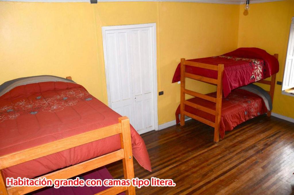 Letto o letti in una camera di Hostal Kuyen