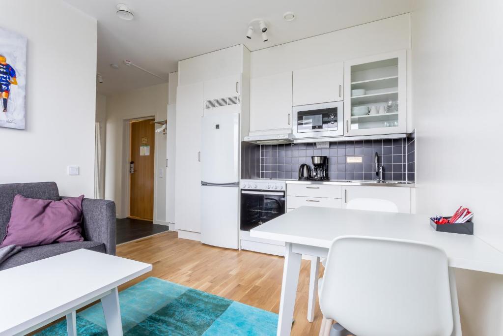 Kuchyň nebo kuchyňský kout v ubytování ApartDirect Linköping Arena