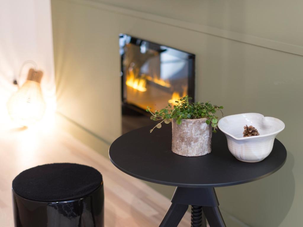 TV a/nebo společenská místnost v ubytování MiHotel Comte