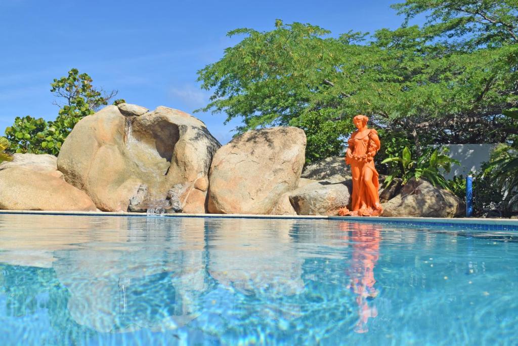 The swimming pool at or near Villa Bougainvillea Aruba, the Tango Suite