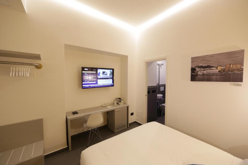Telewizja i/lub zestaw kina domowego w obiekcie Cellamare Suite & Spa