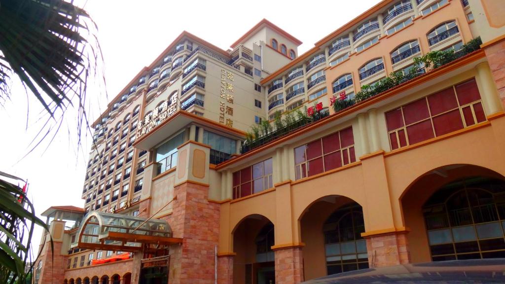 a large building with plants on the top of it at Clayton Hotel-Near Pazhou Exhibition Center in Guangzhou