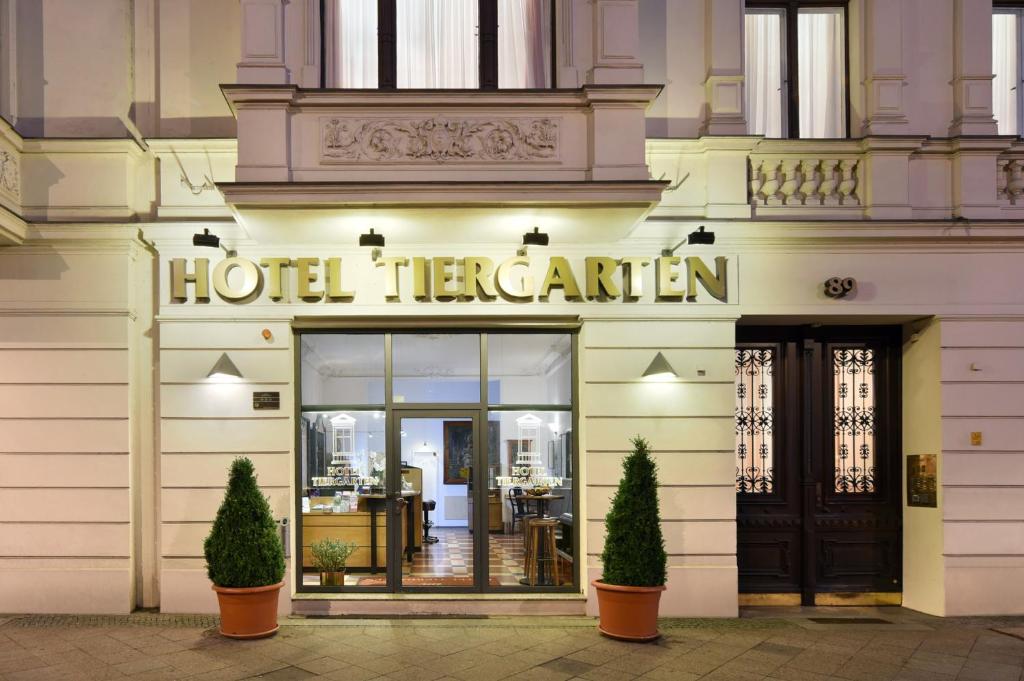 a hotel sign on the front of a building at Hotel Tiergarten Berlin in Berlin