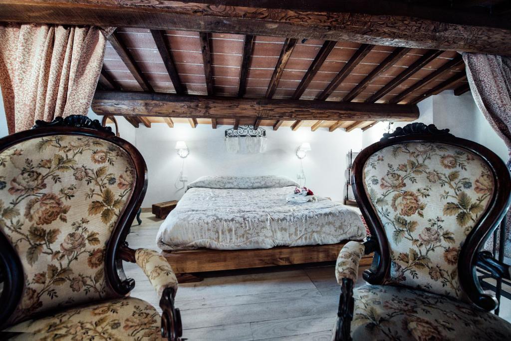 Posteľ alebo postele v izbe v ubytovaní Agriturismo Palazzo Conti A