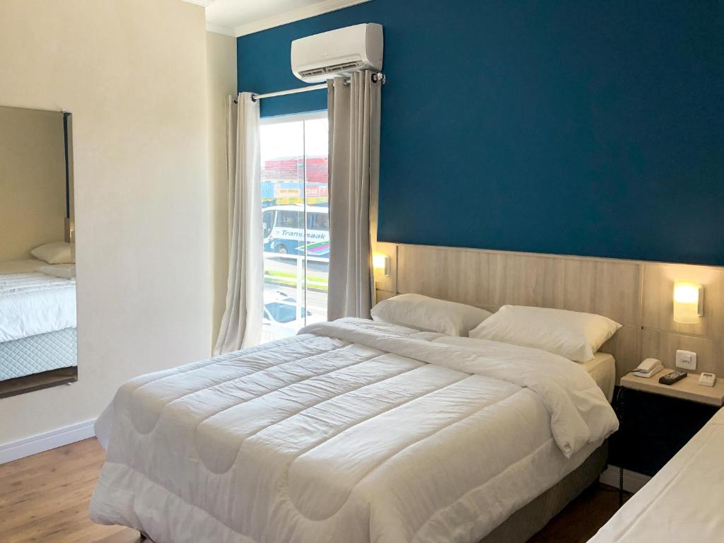 Sense Hotel Araucária - Standard Triple Room