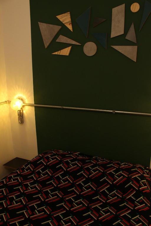 Postel nebo postele na pokoji v ubytování NeighborHUB hostel e coliving