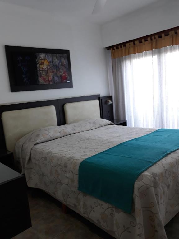 Кровать или кровати в номере Hotel Adriatico