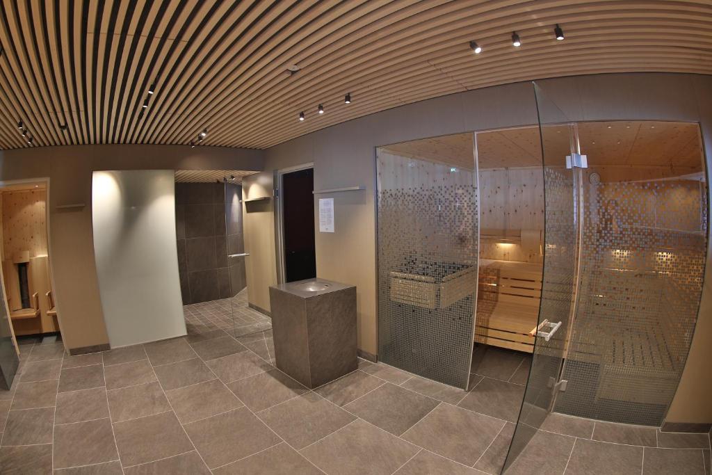 Ванная комната в Hotel Appartement Roggal