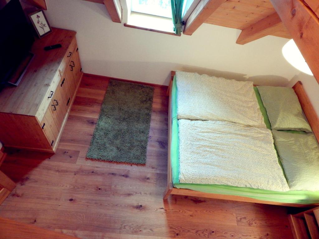 Postel nebo postele na pokoji v ubytování Kajzrovka